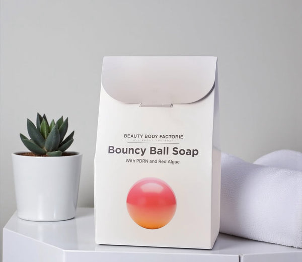 BOUNCY BALL SOAP – Nettoyant visage revitalisant au PDRN & algues rouges